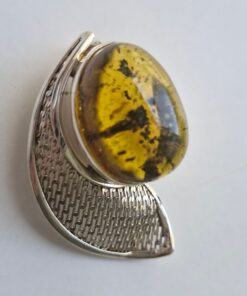 Dije gota ovalada de ámbar